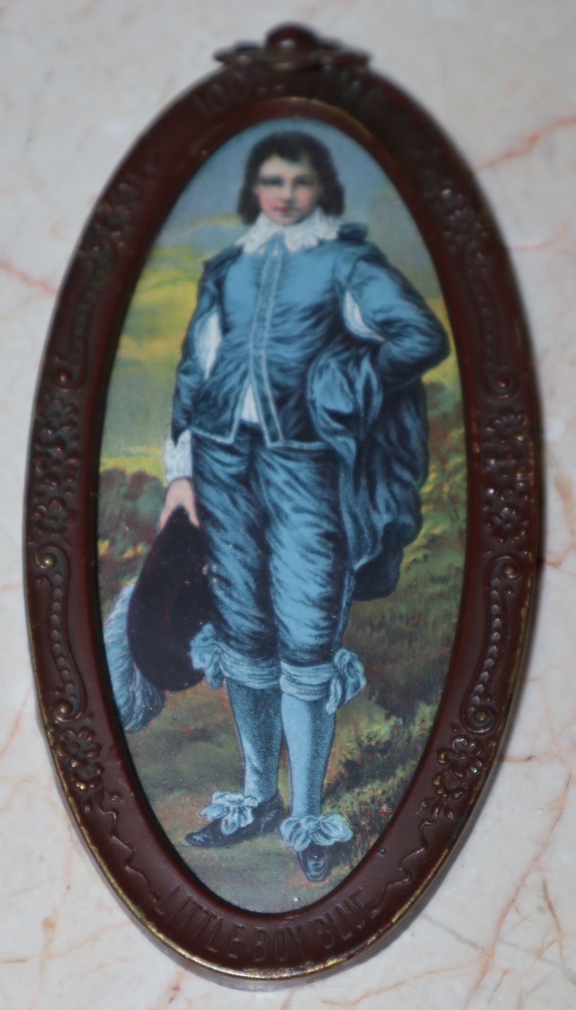 [Commemorative Theatrical Tchotchke] Oval Print of the Blue Boy Painted by Gainsborough. Issued to mark 100th Time, Little Boy Blue, Lyric Theatre, New York, February 12, 1912