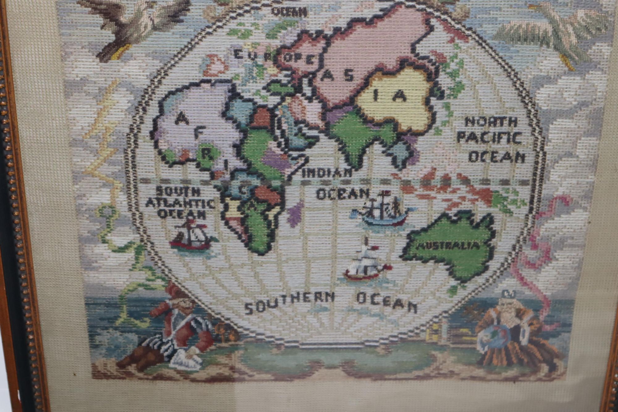 Two Framed Nineteenth Century Needlepoint Maps. The Eastern Hemisphere and [the Southern Hemisphere]