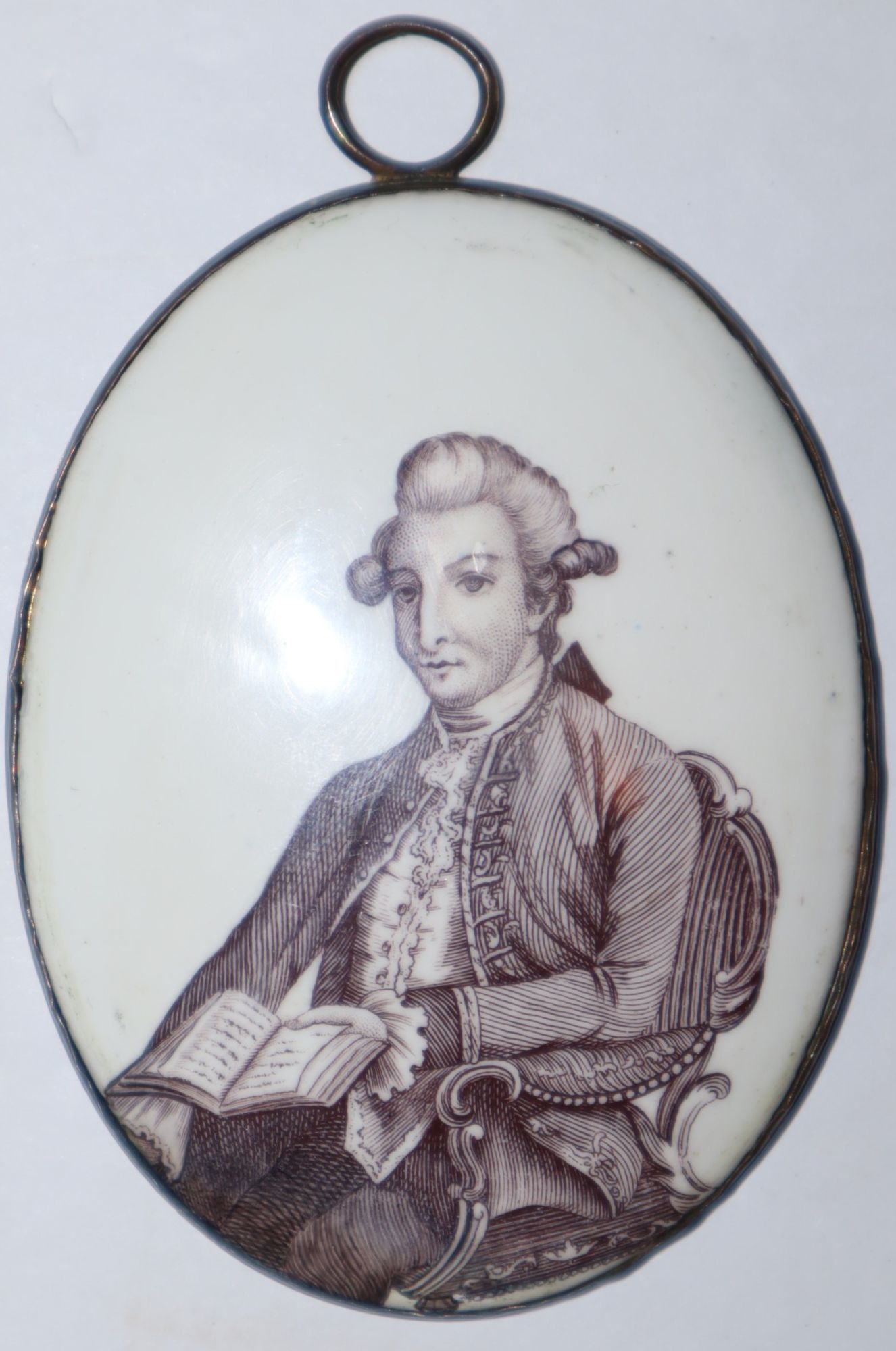 Miniature Medallion on Porcelain of a Young David Garrick Holding a Book